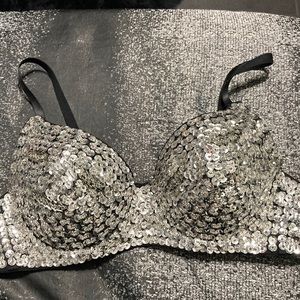 Silver sequins over black bralette